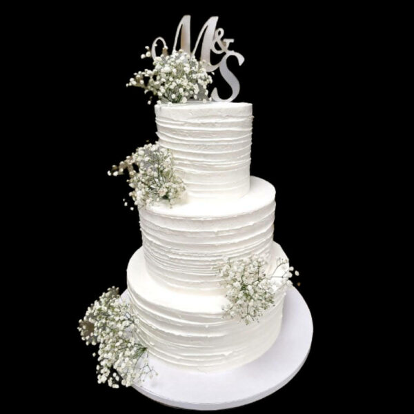 Fehér rezgős háromemeletes esküvői torta